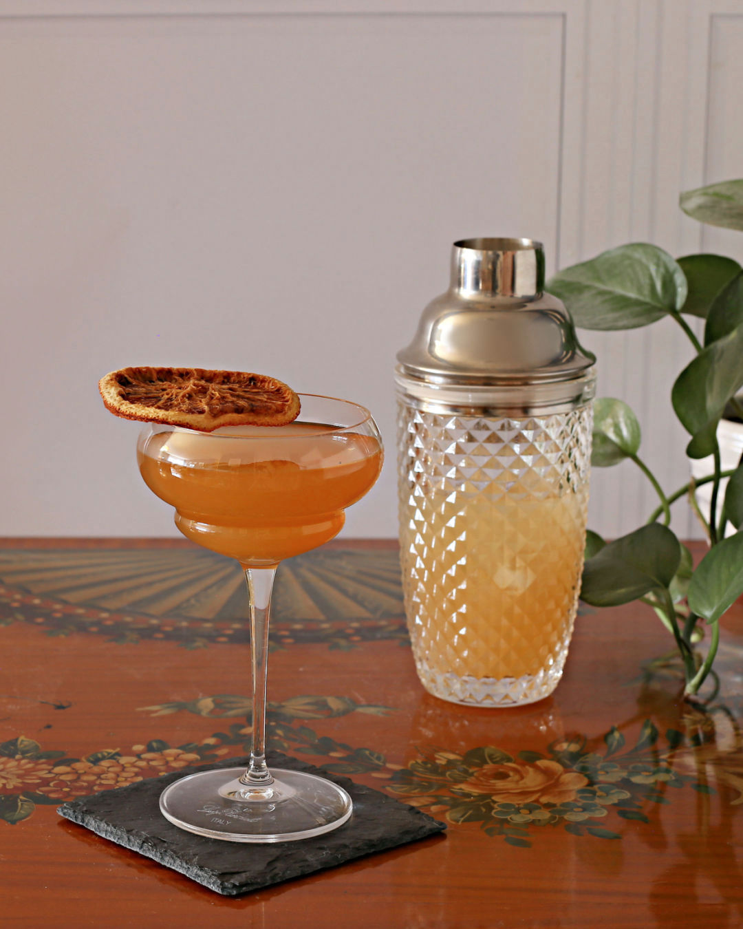 A classic Between the Sheets cocktail with cognac, white rum, lemon juice, and Rustic Oak Orange Mixer, served in a chilled coupe glass.