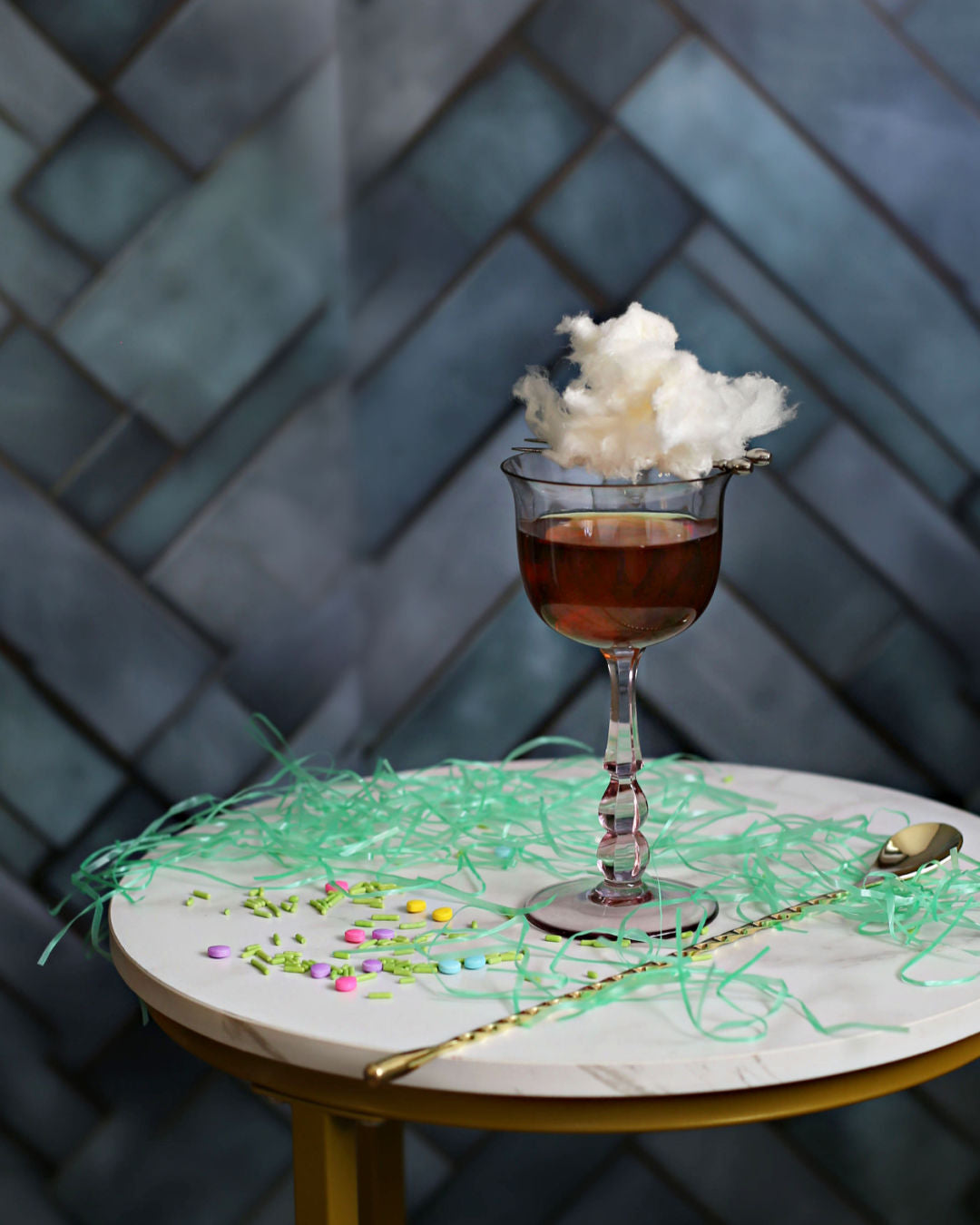A Maple Cotton Candy Old Fashioned with whiskey, maple syrup, and Rustic Oak Traditional Mixer, topped with a fluffy maple cotton candy garnish.