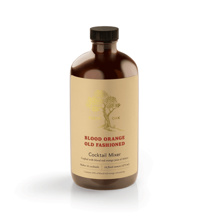 Bottle of amber glass bottle on white background. Label display Blood Orange Old Fashioned Cocktail Mixer. Crafted with blood red orange juice and bitters. Makes 32 cocktails, 16 fluid ounces (473ml). Contains 4.8% of blood red orange concentrate.
